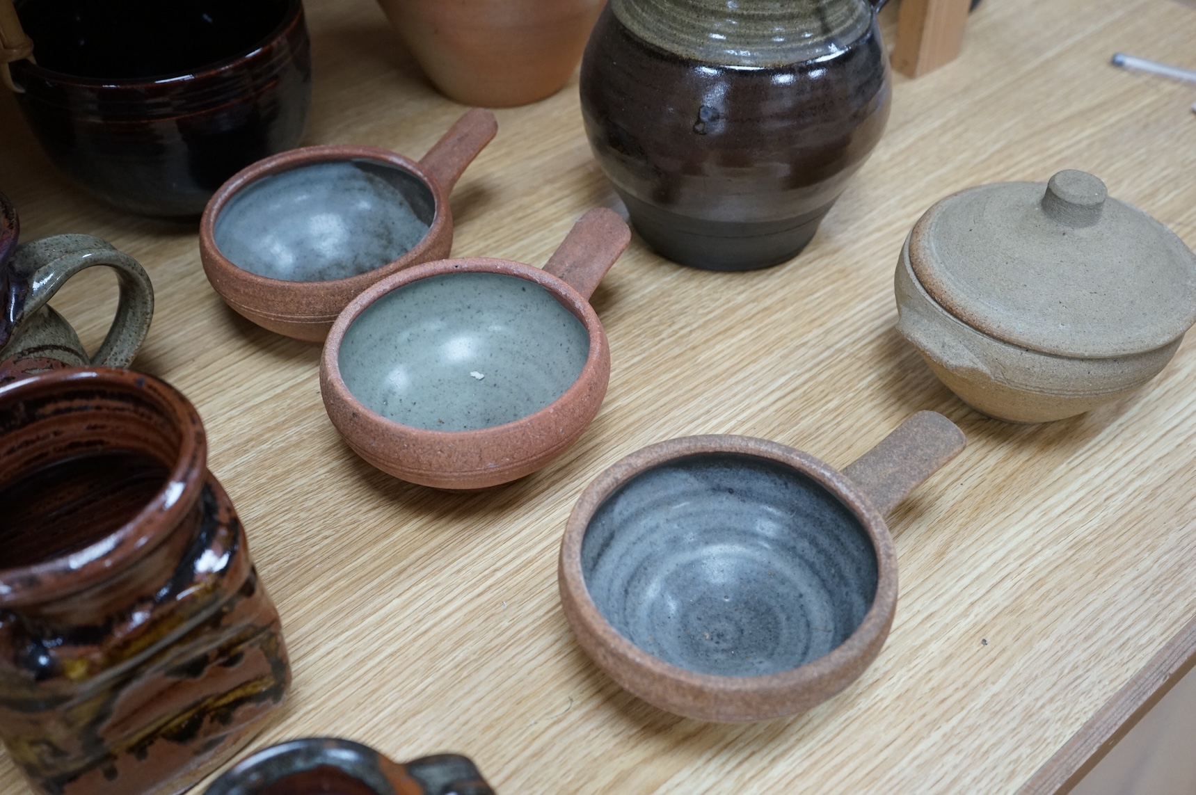 A large group of 20th century signed and unsigned Studio pottery, tallest 23cm high